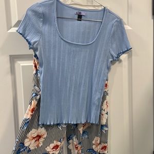 Wide-legged, flowy floral pants with a fitted, ribbed short-sleeved shirt